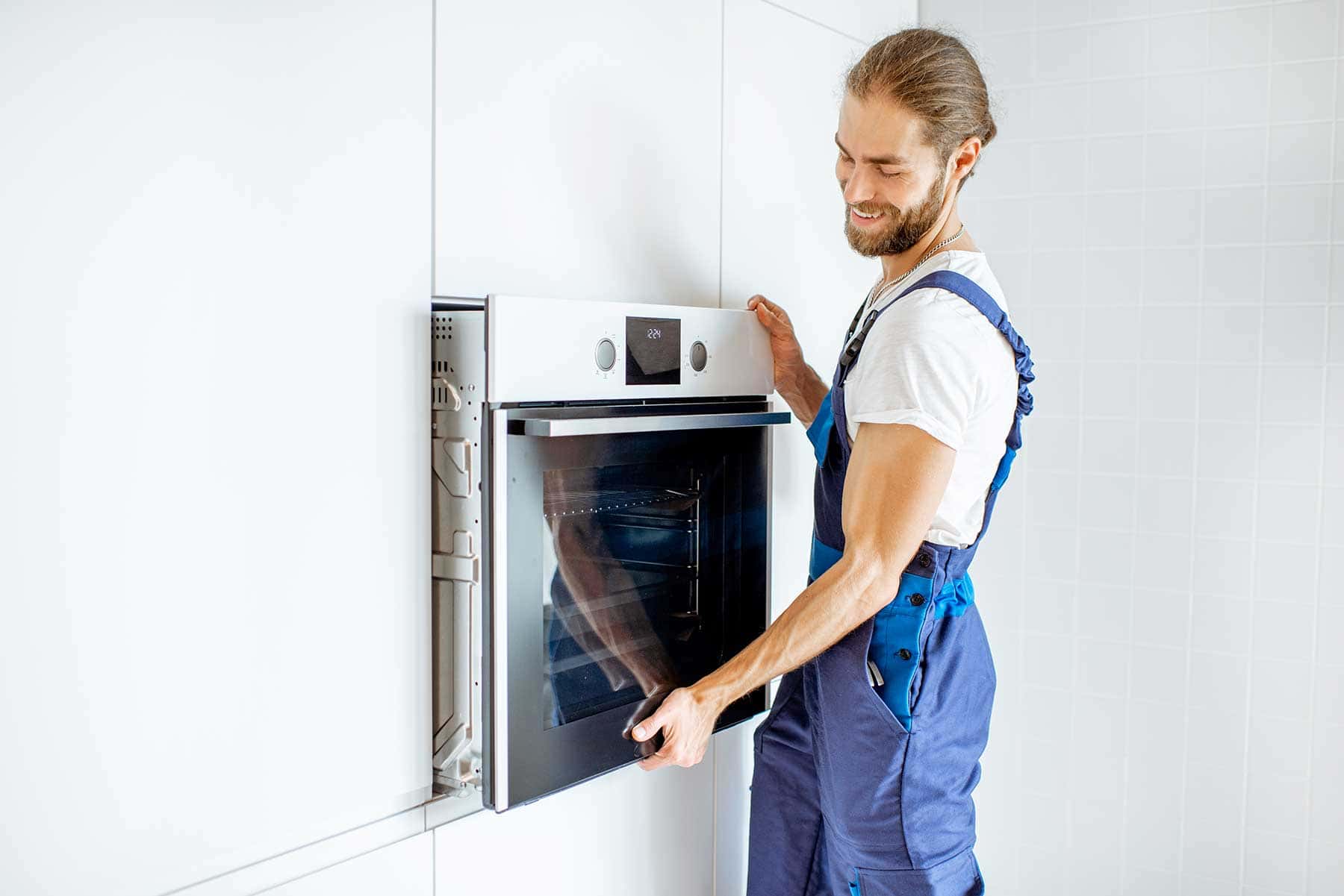 Mississauga Appliance Installation Mississauga Appliance Installation   Appliance Installation Edmonton Man Installing An Oven 